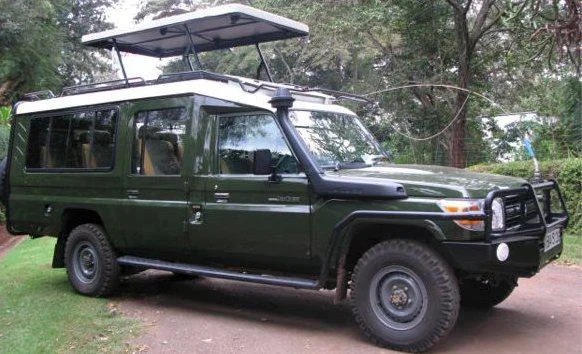 Car rental considerations for private tour vs private tour in Uganda travel photograph